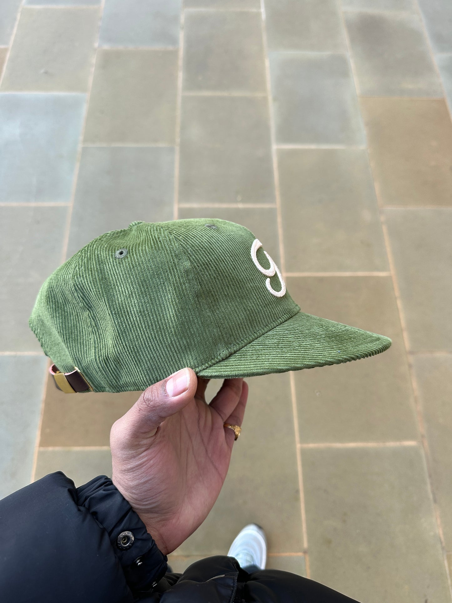 Corduroy cap.  Olive oil’